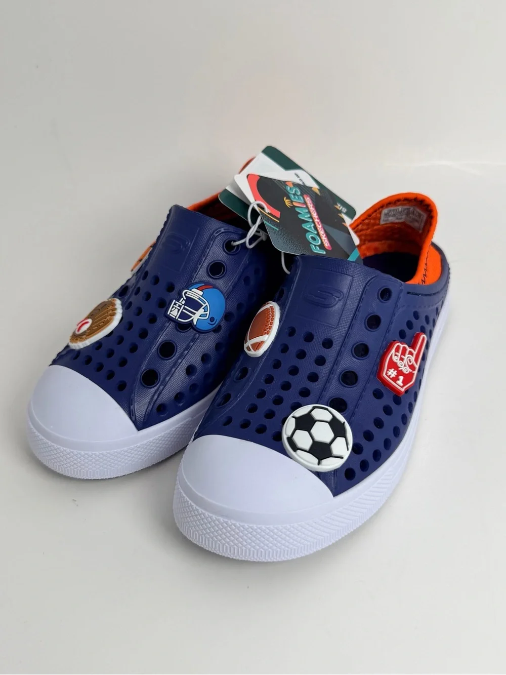 Skechers Navy Blue Kids Slip-On Sport Sandals with White Toe and Orange Lining